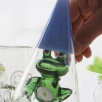 Hand-blown frog glass bong with cone-shaped body and artistic design