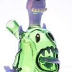 monster glass bong with cartoon-style face and tongue design