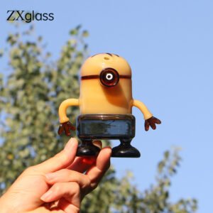 Cartoon glass bong shaped like a funny hand-blown character