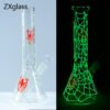 Glow-in-the-dark spider web glass bong with handcrafted spider design and premium borosilicate glass